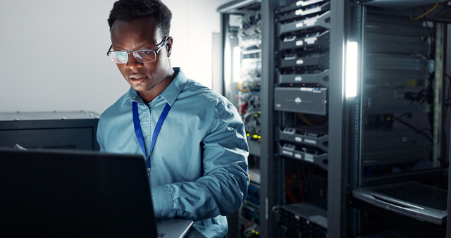 Engineer working on servers and infrastructure